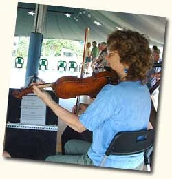Mary playing a dance